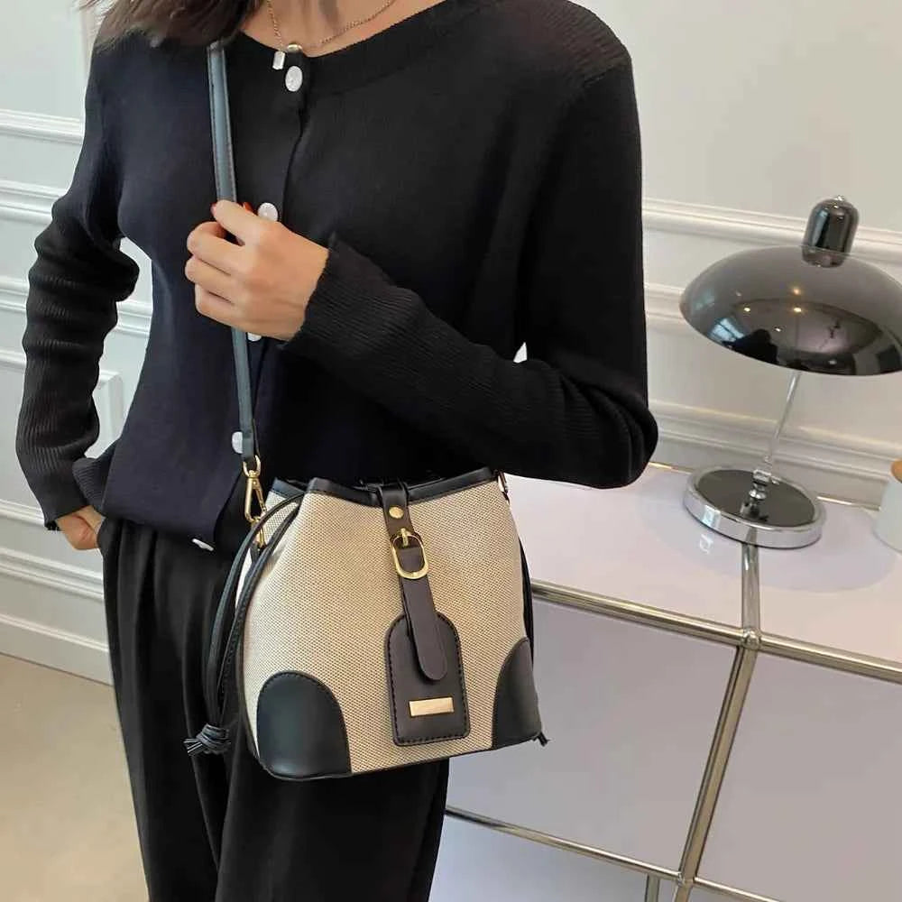 Straw Braided Adjustable Strap Crossbody Bag.