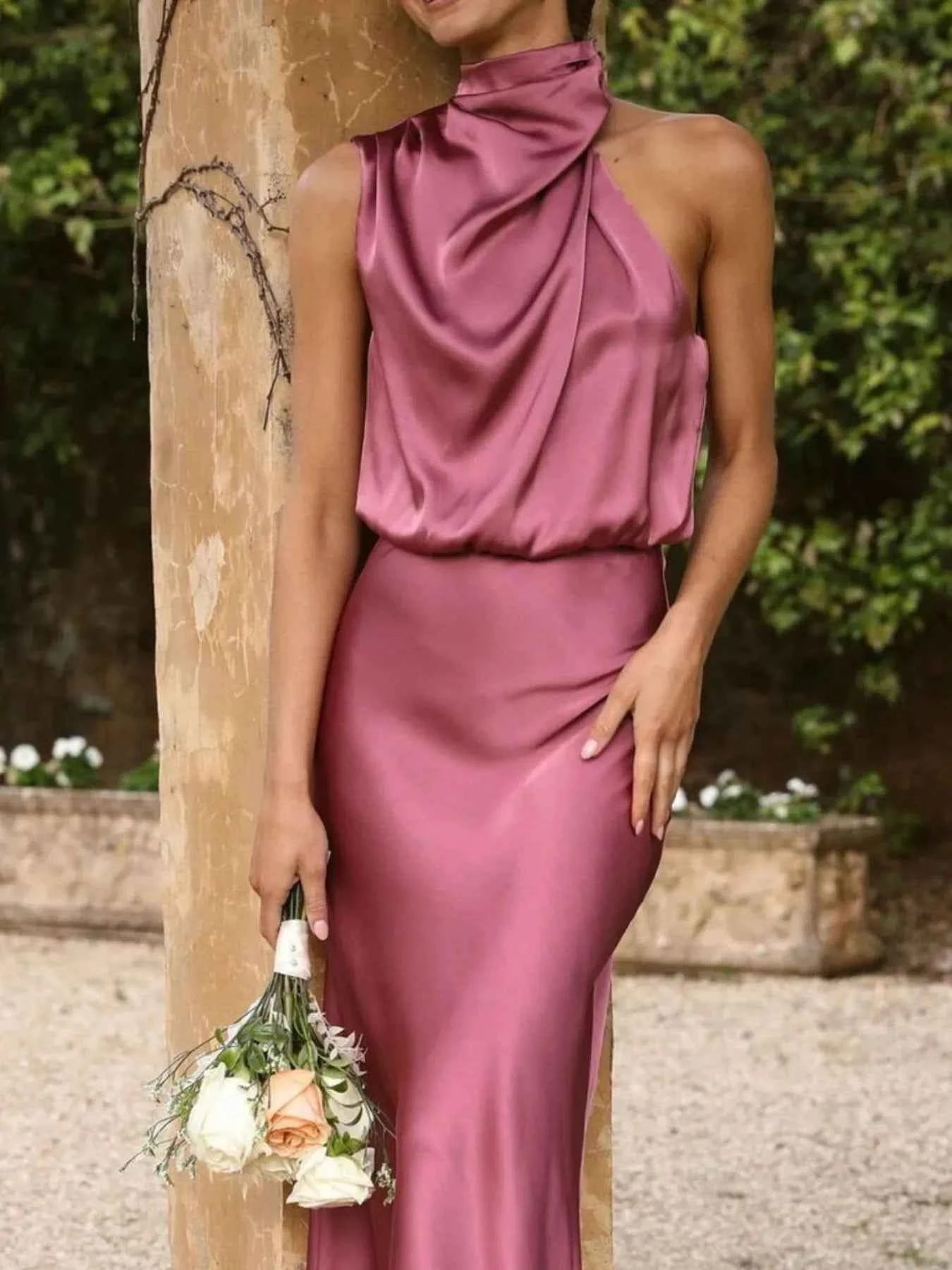 Asymmetrical Ruched Sleeveless Midi Dress.
