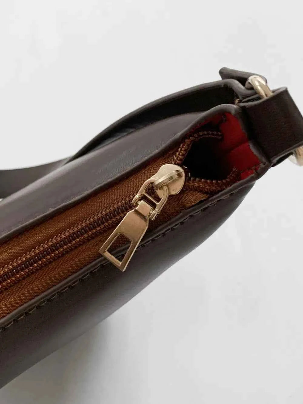 PU Leather Medium Shoulder Bag with EarPods Compartment.