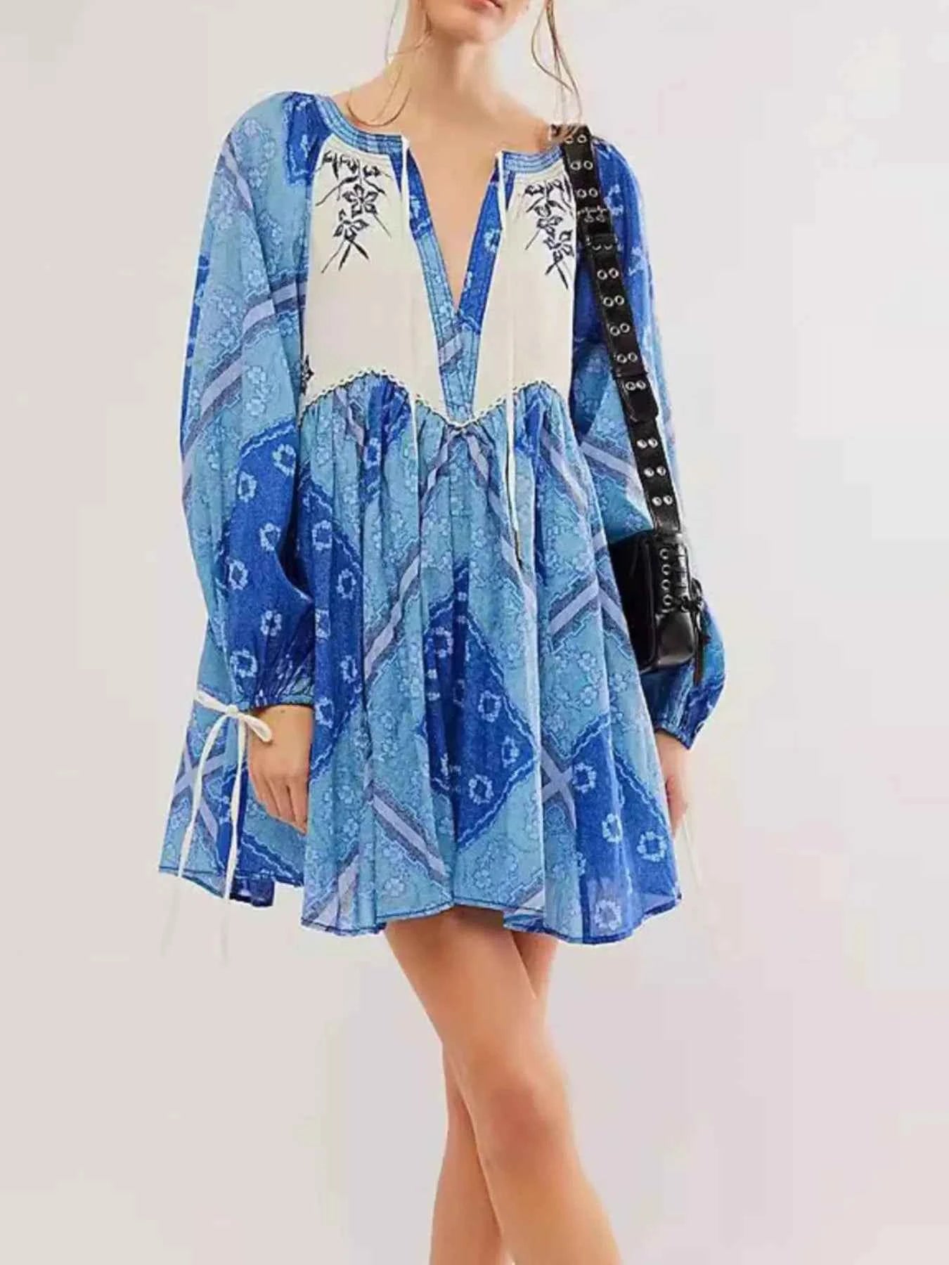 Printed Tie Neck Long Sleeve Dress.