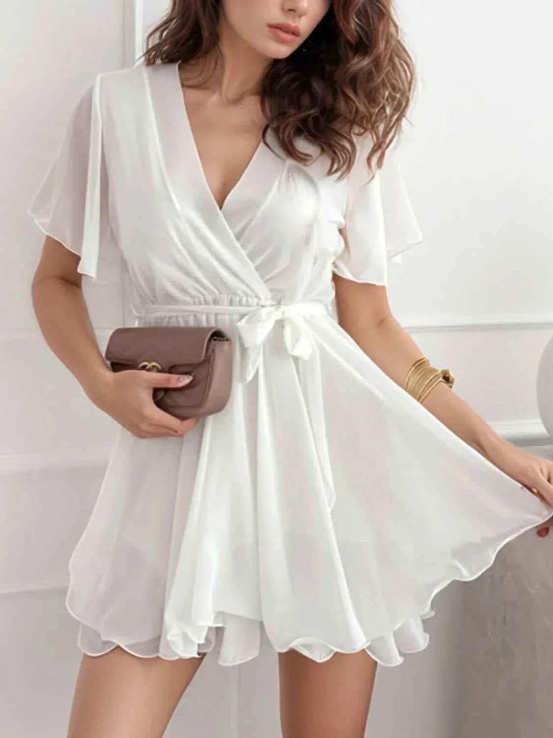 Surplice Flutter Sleeve Mini Dress.