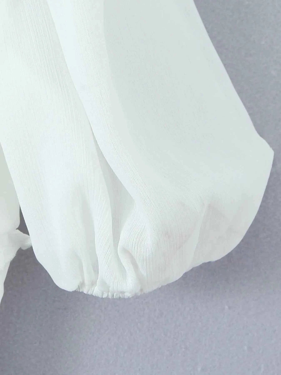 Frill V-Neck Puff Sleeve Blouse.