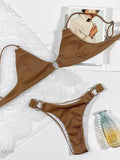 Stylish plunge spaghetti strap bikini set in brown with unique ring details and minimal coverage