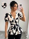 Puff Sleeve Peplum Blouse in Eye-Catching Prints - EBYNN