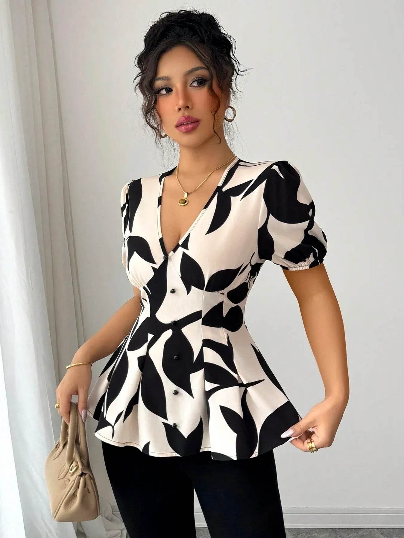 Puff Sleeve Peplum Blouse in Eye-Catching Prints - EBYNN