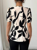 Puff Sleeve Peplum Blouse in Eye-Catching Prints - EBYNN
