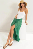 Trendsi ruffle trim sarong skirt in green, elegantly styled for summer beachwear with a laid-back look