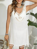 White tassel scoop neck cover-up with crochet detailing and fringe hem for beachwear style