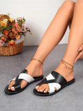 Two-Tone Flat Sandals.