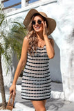 Model wearing a Summer Crochet Swim Cover Up with a hat and sunglasses, perfect for beach outings