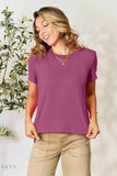 Trendsi women's basic black t-shirt listing shown on model wearing a mauve short sleeve tee with layered necklaces