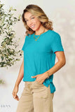 Trendsi women's basic black t-shirt shown on model wearing teal short sleeve casual tee with pants