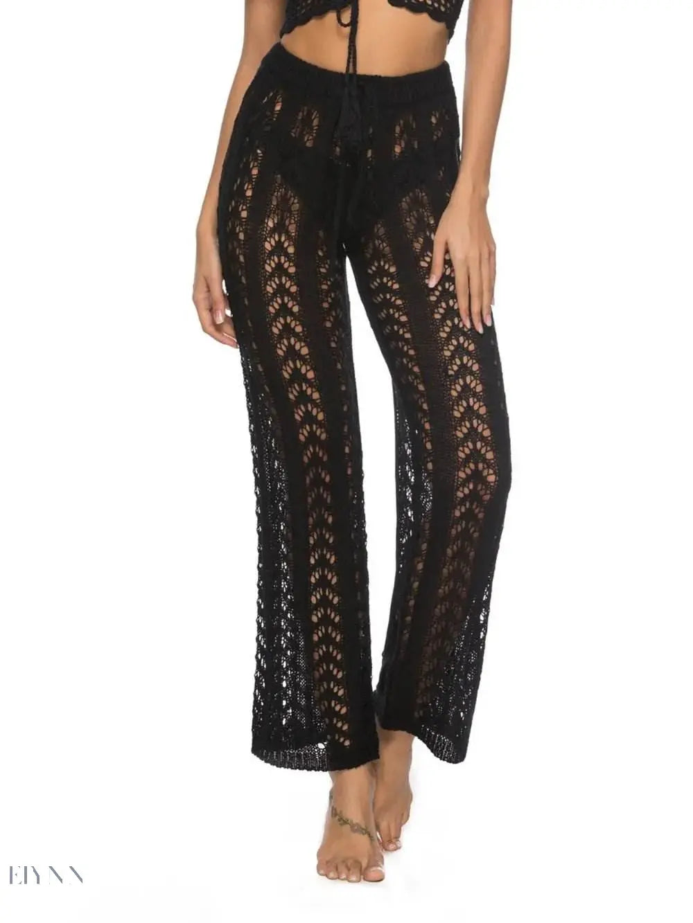 Trendy women's drawstring beach pants in black with a flowy open knit design for summer style