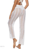 Trendy women's drawstring beach pants in white with a lace design for summer outings