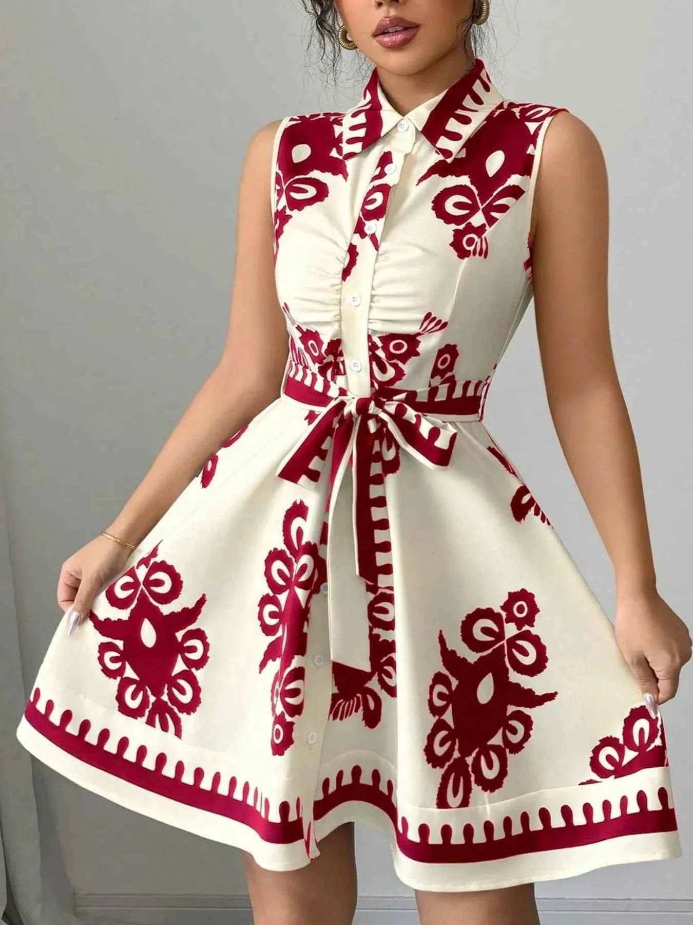 Printed Sleeveless Tie Waist Mini Dress.