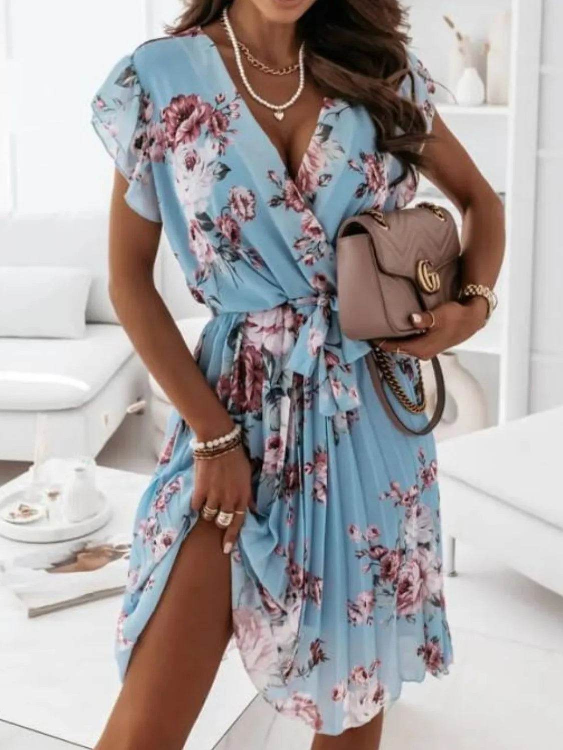 Floral Surplice Ruffled Cap Sleeve Dress.