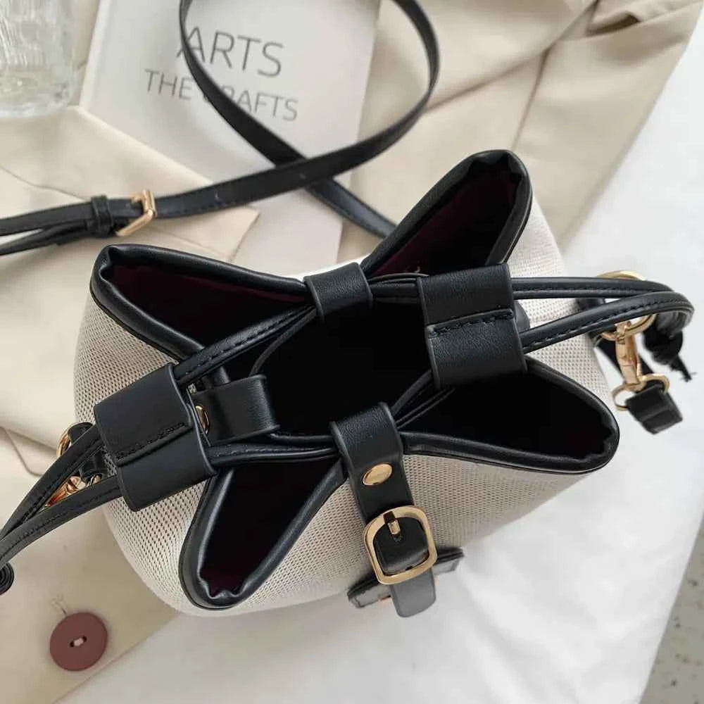 Straw Braided Adjustable Strap Crossbody Bag.