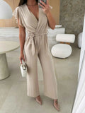 Surplice Wide Leg Belted Jumpsuit.