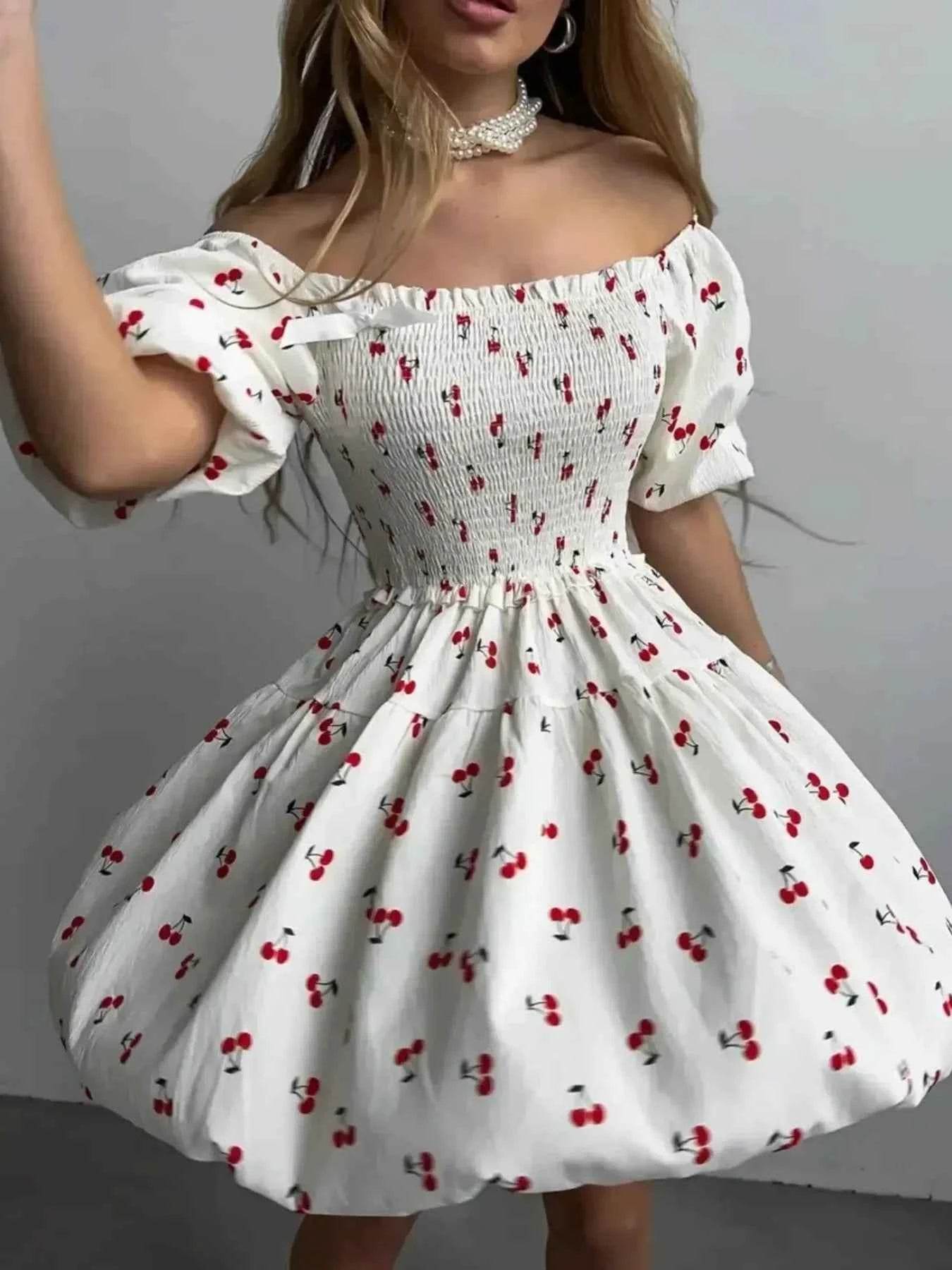 Puff Sleeve Cherry Print Smocked Mini Dress.