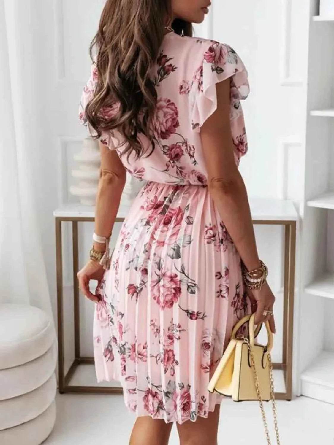 Floral Surplice Ruffled Cap Sleeve Dress.