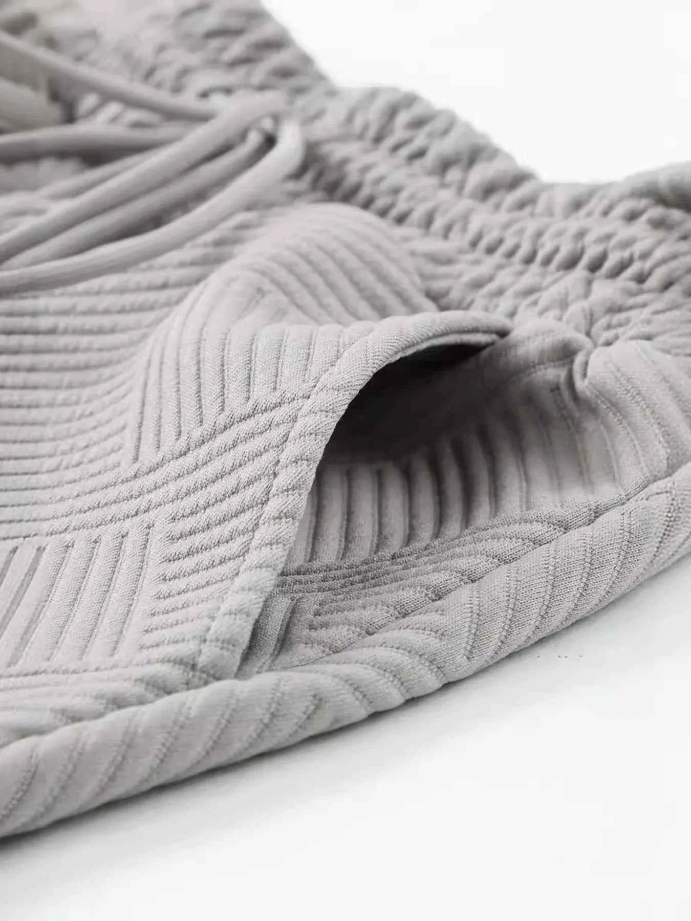 Textured Round Neck Top and Shorts Two-Piece Set.