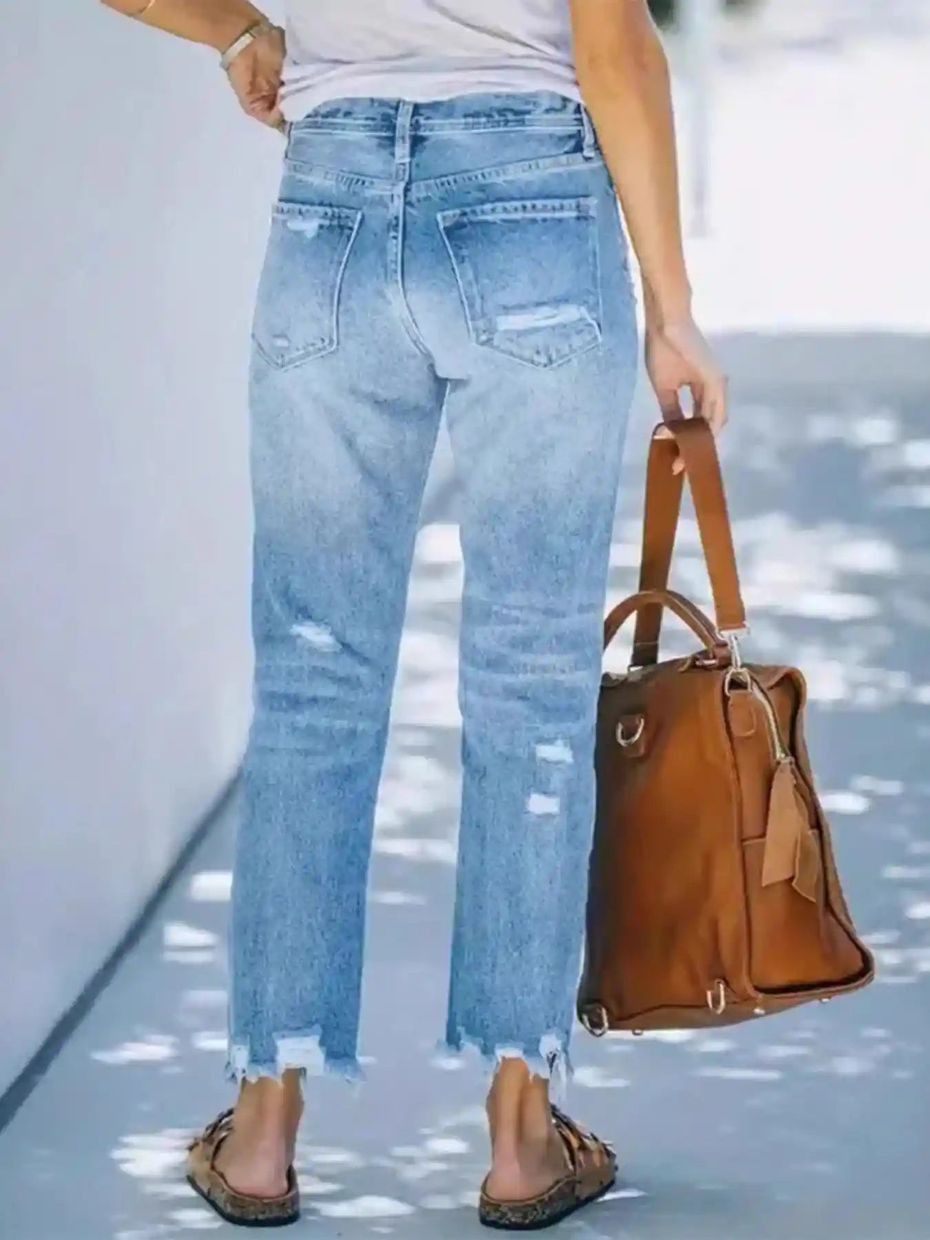 Distressed Straight Leg Jeans.
