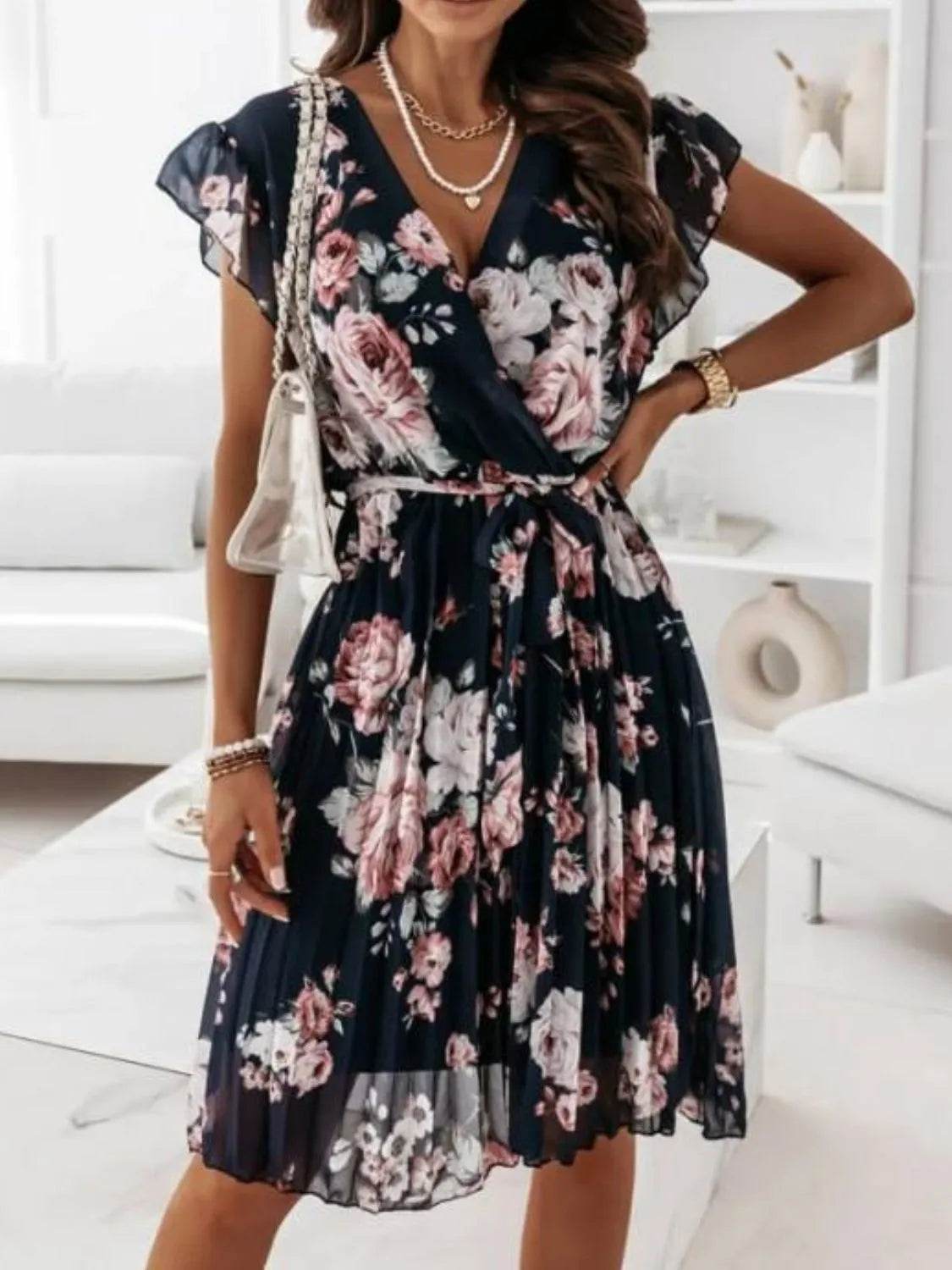 Floral Surplice Ruffled Cap Sleeve Dress.