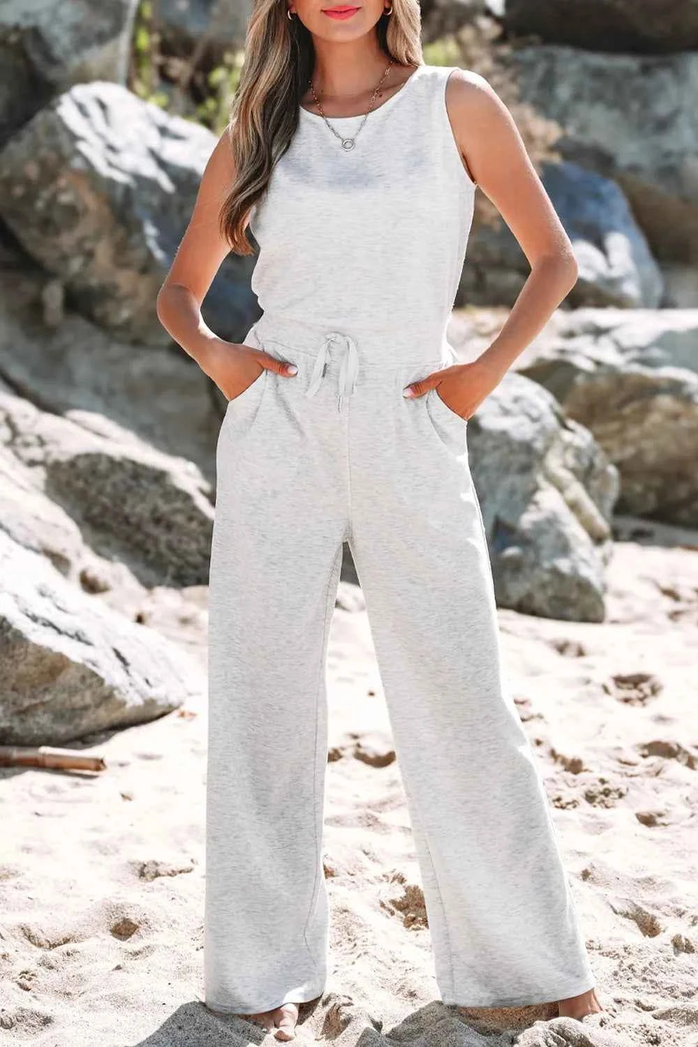 Solid Color High Waist Sleeveless Jumpsuit with Drawstring.