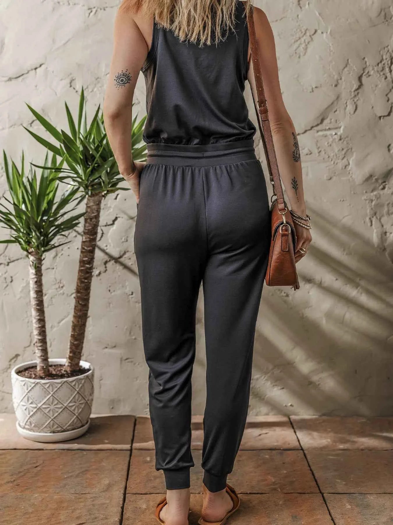 Tie Waist Sleeveless Jogger Jumpsuit.