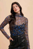 Annie Wear Floral Lettuce Hem Sheer Mesh Top.