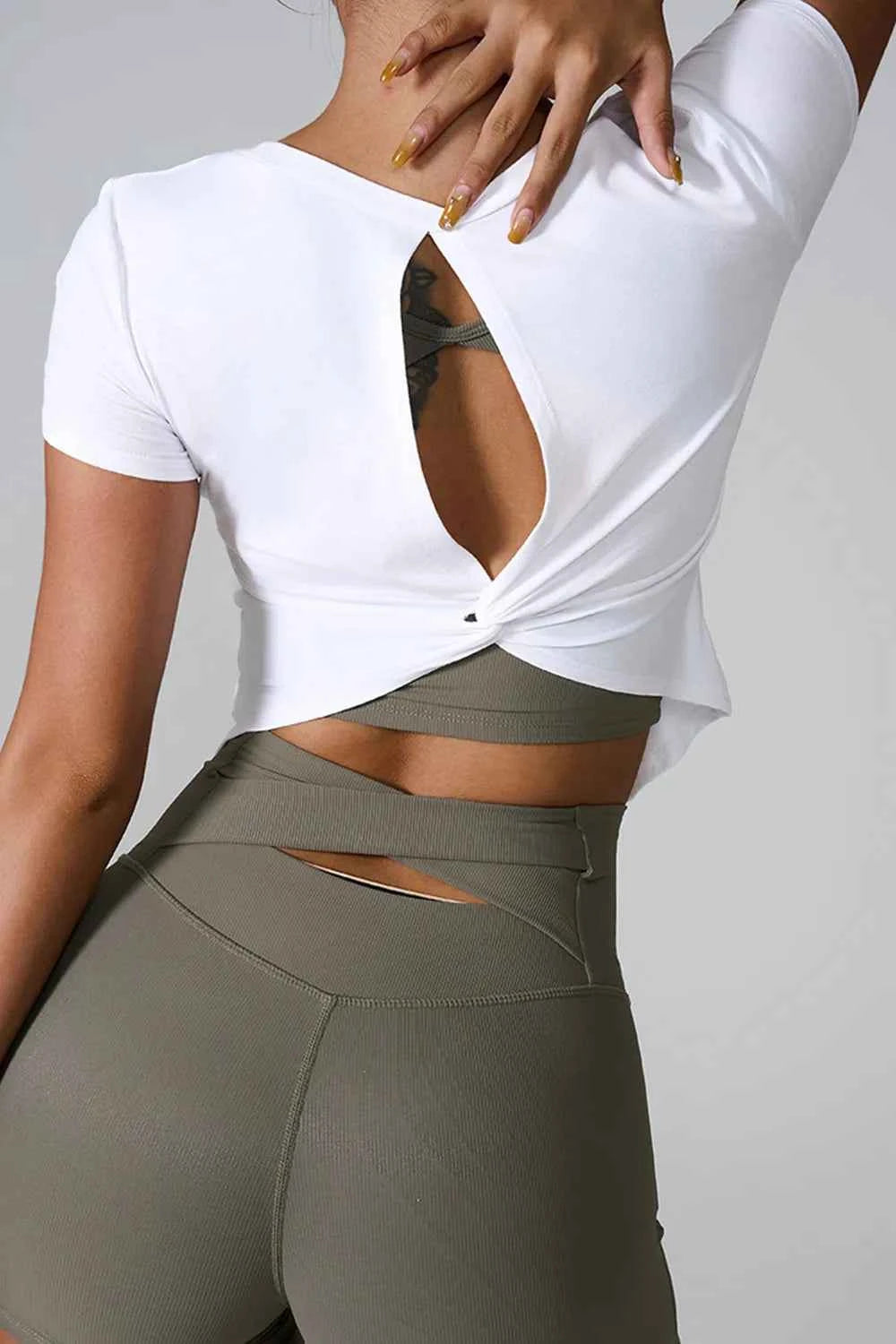 Cutout Round Neck Short Sleeve Active T-Shirt.