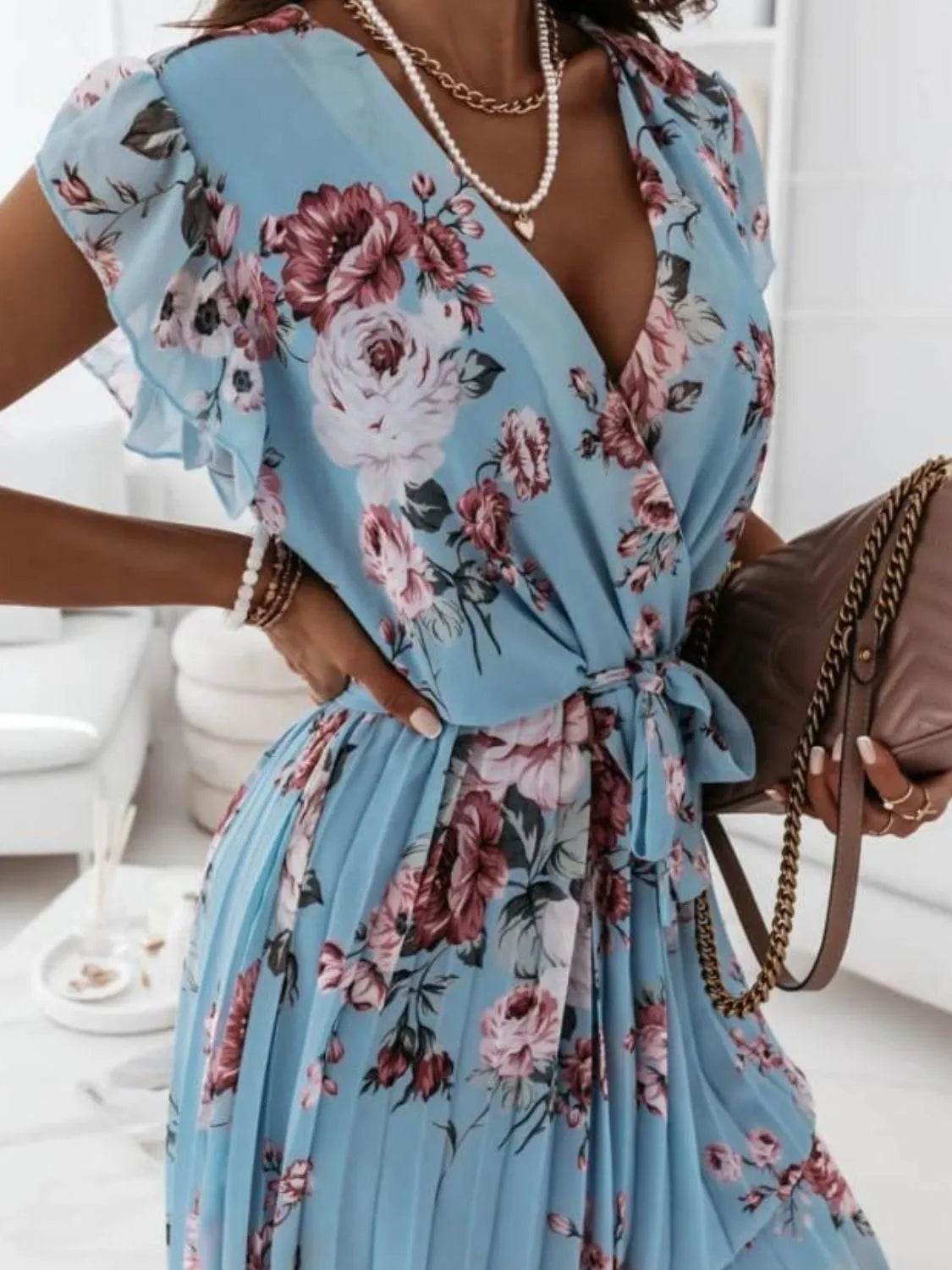 Floral Surplice Ruffled Cap Sleeve Dress.