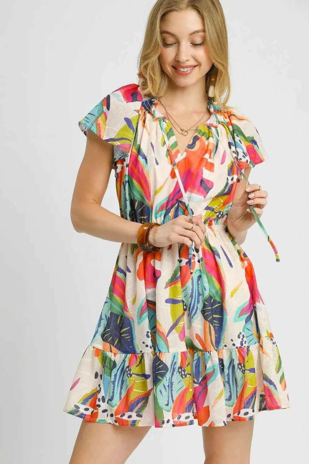 Umgee Tropical Print Tie Neck Ruffled Hem Mini Dress.