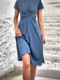 Surplice Sleeveless Wrap Dress.