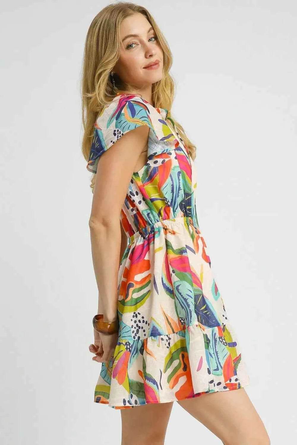 Umgee Tropical Print Tie Neck Ruffled Hem Mini Dress.