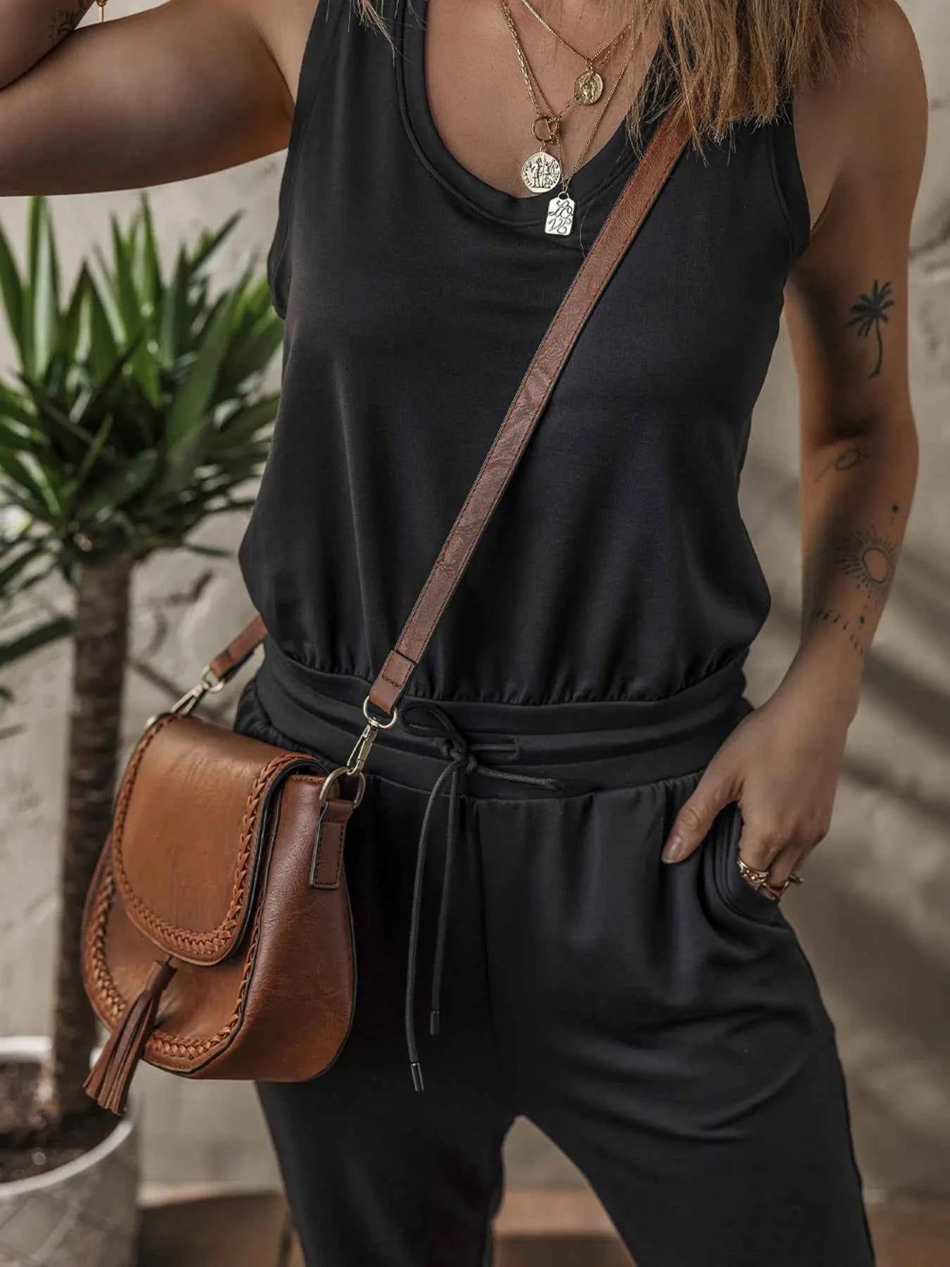 Tie Waist Sleeveless Jogger Jumpsuit.