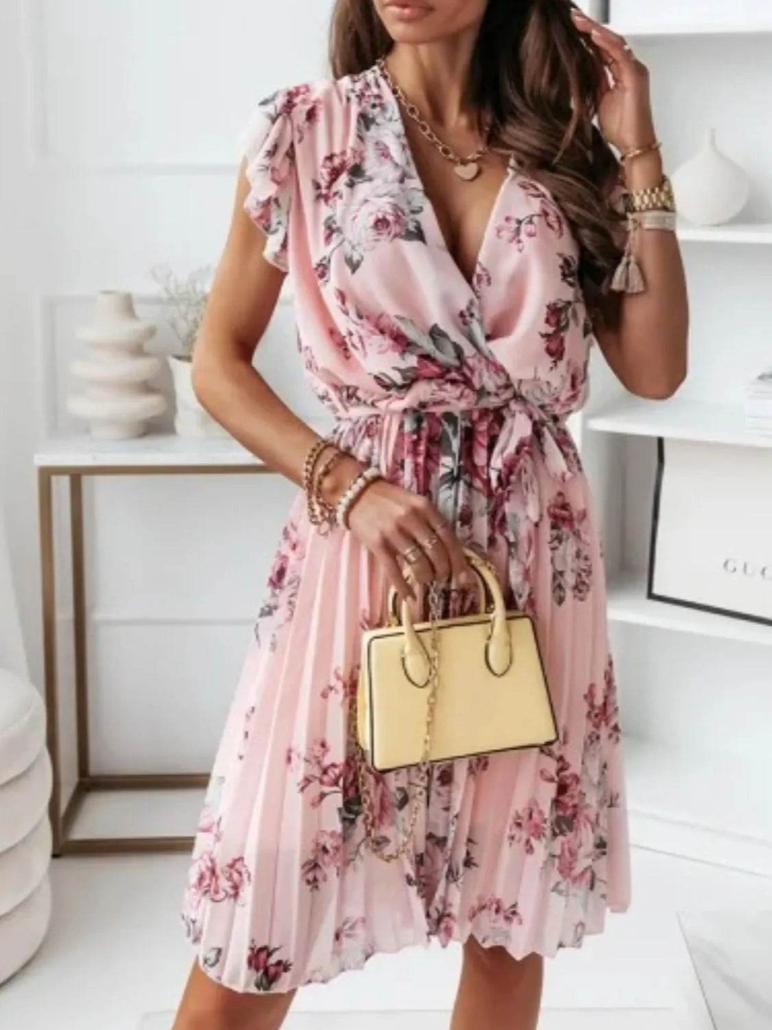 Floral Surplice Ruffled Cap Sleeve Dress.