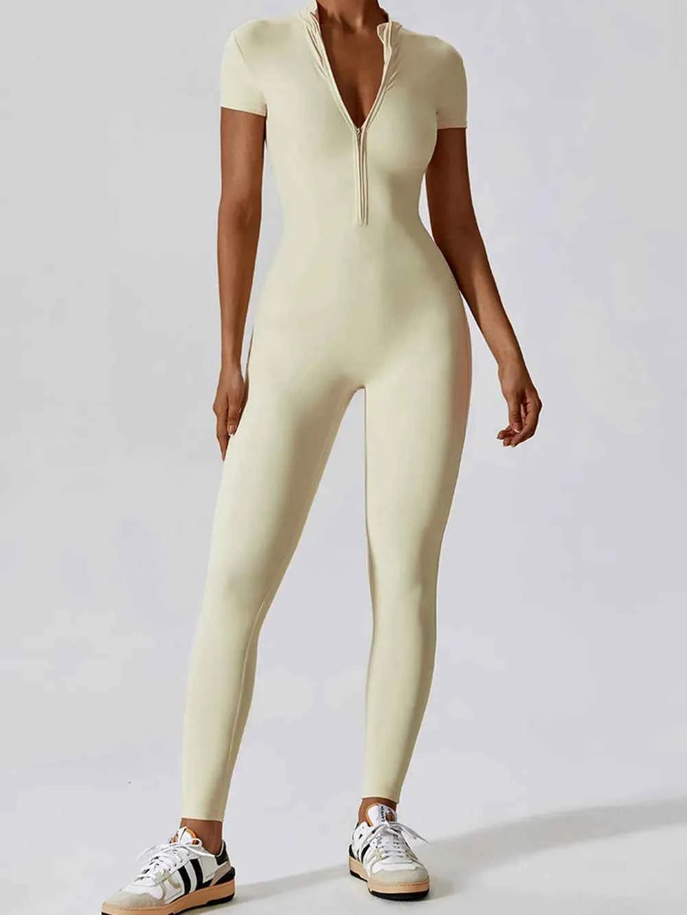 Basic Bae Half Zip Short Sleeve Active Jumpsuit.