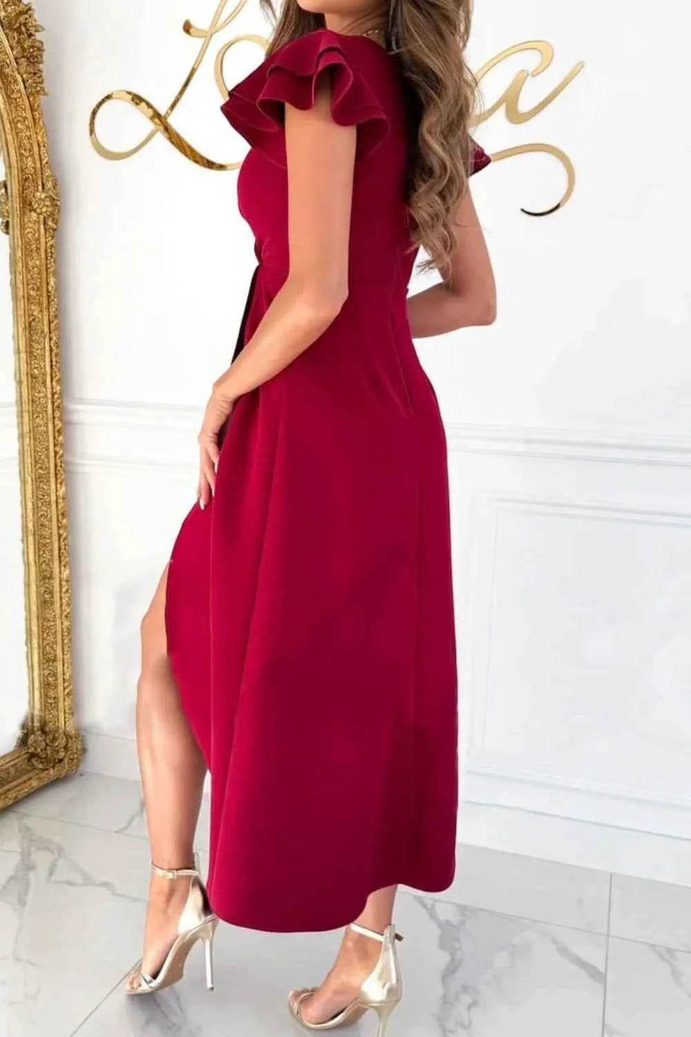 Surplice Ruffled Cap Sleeve Zip Back Dress.