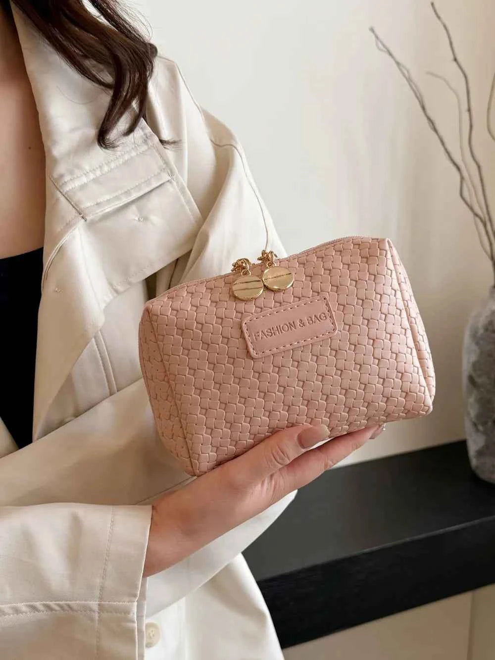 PU Leather Woven Clutch Bag.