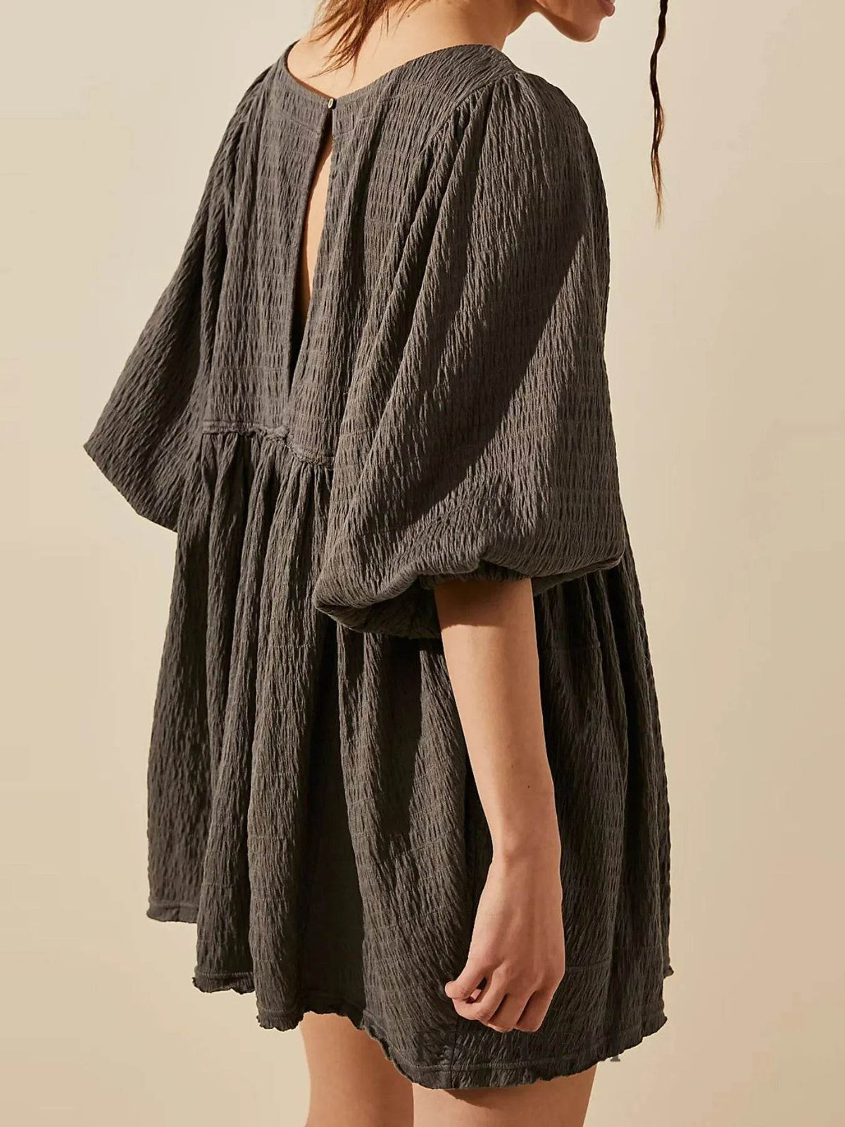 Relaxed Textured Babydoll Mini Dress with Keyhole Back.