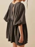 Relaxed Textured Babydoll Mini Dress with Keyhole Back.