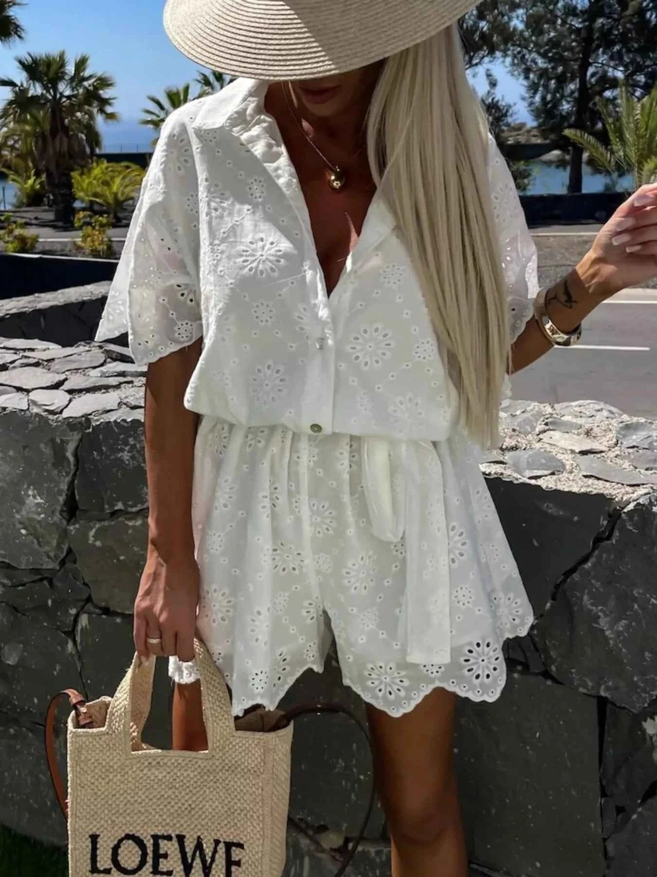 Eyelet Lace Button-Up Romper.