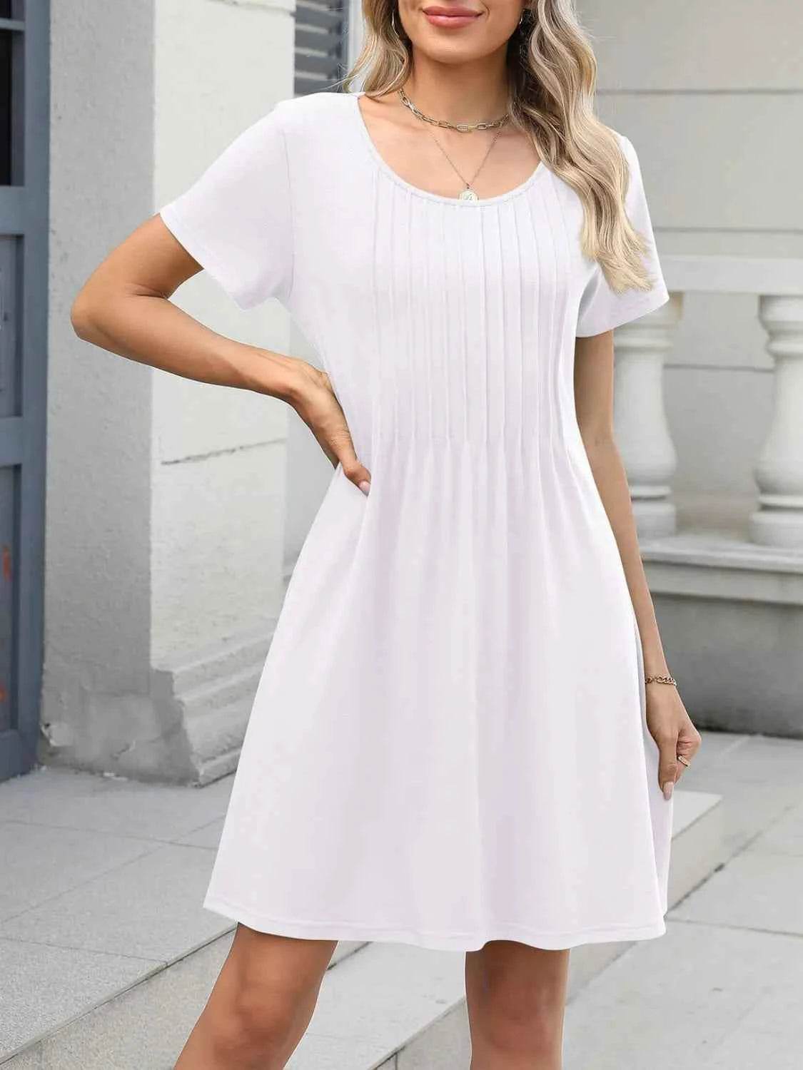 Pleated Front Round Neck Swing Dress.