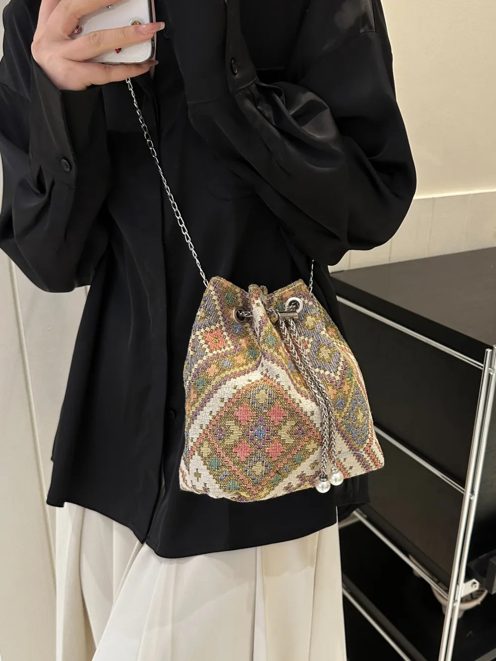 Printed Chain Bucket Bag.