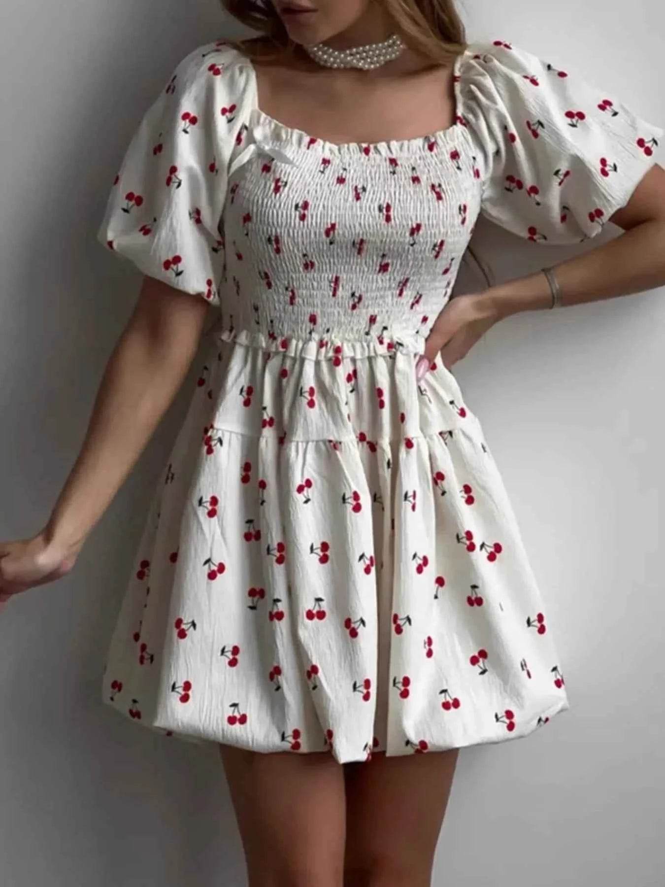 Puff Sleeve Cherry Print Smocked Mini Dress.