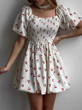 Puff Sleeve Cherry Print Smocked Mini Dress.