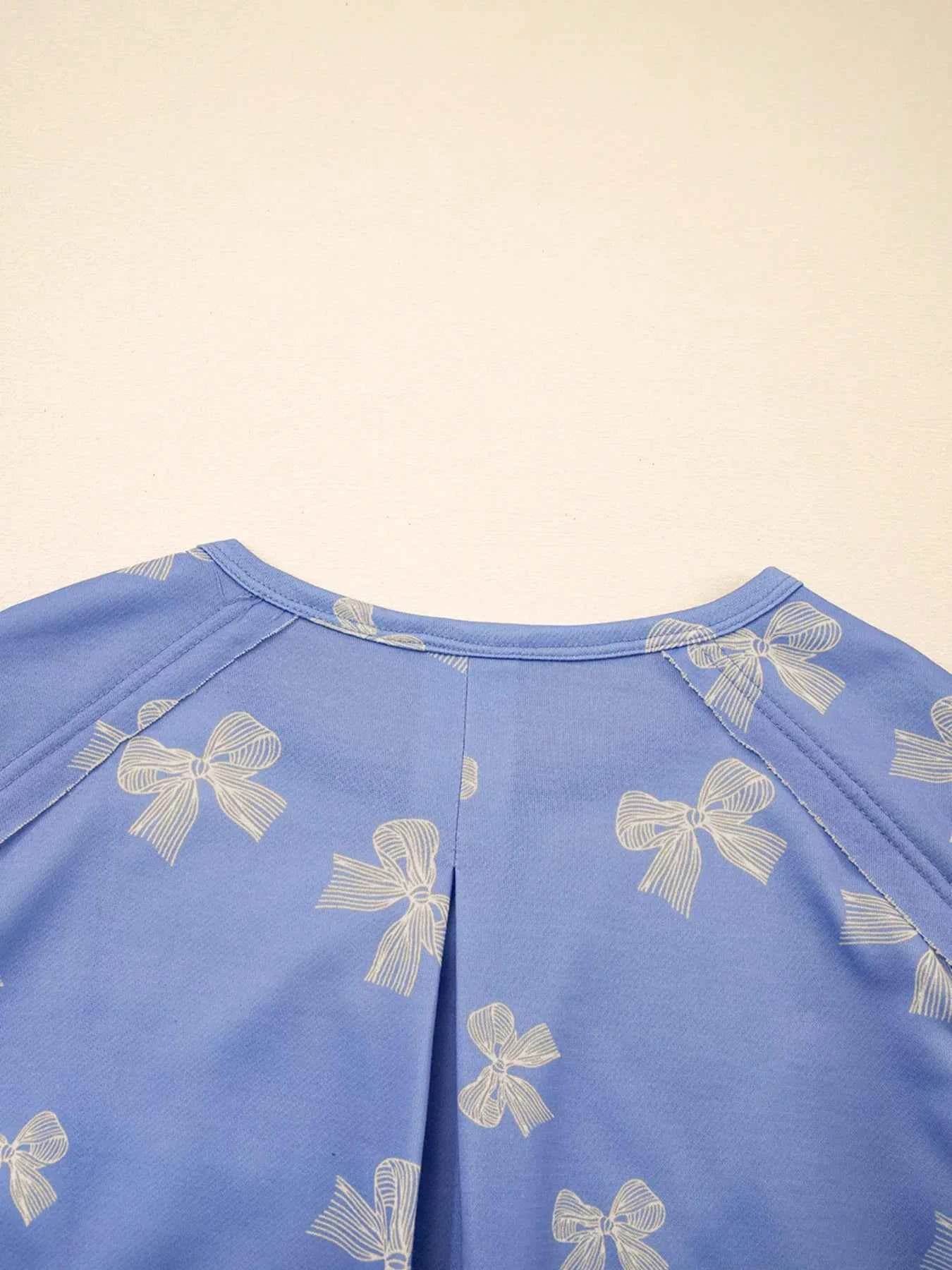 Bow Knot Print Ruffled Sleeve Crewneck Mini Dress.