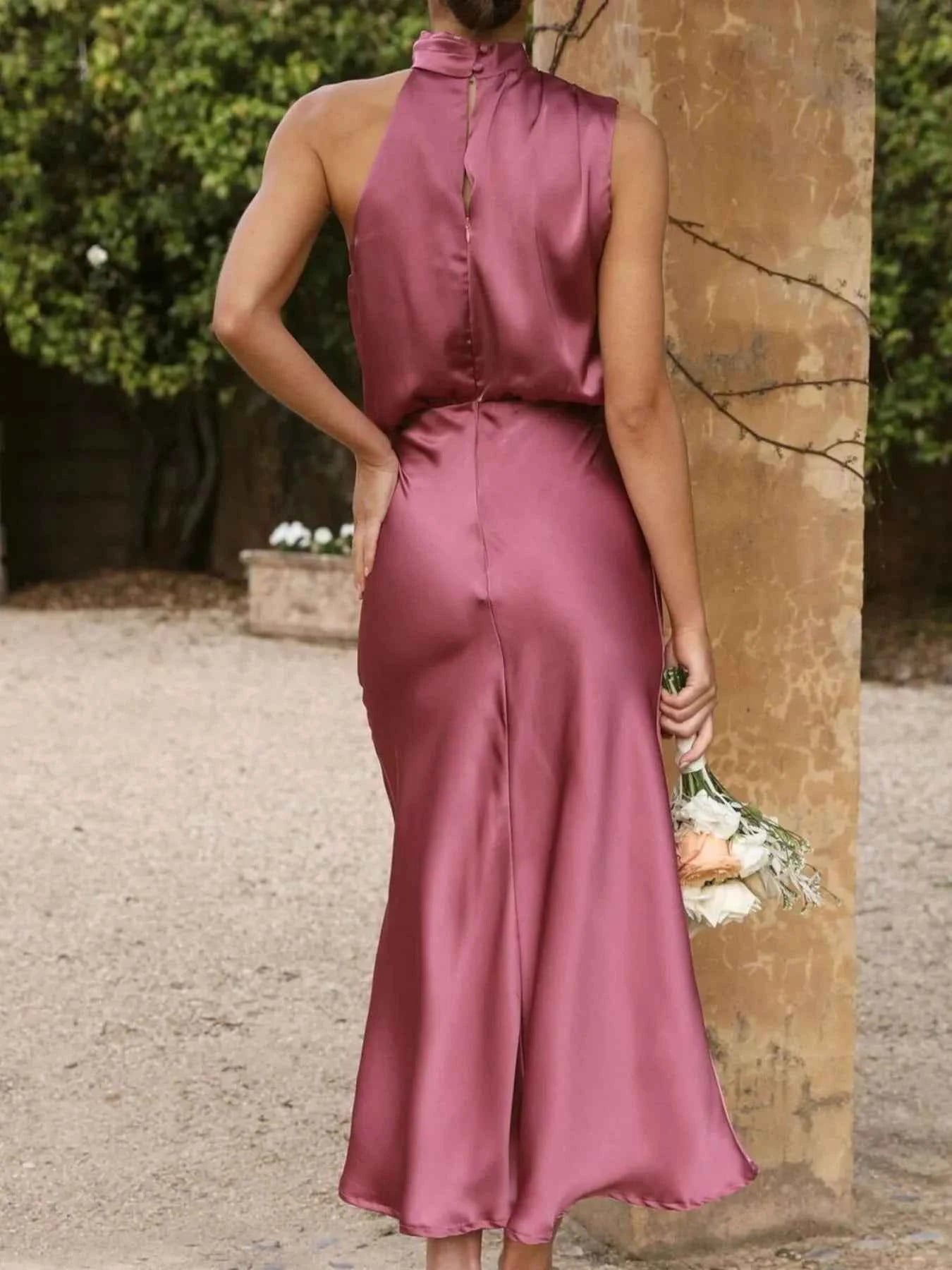 Asymmetrical Ruched Sleeveless Midi Dress.