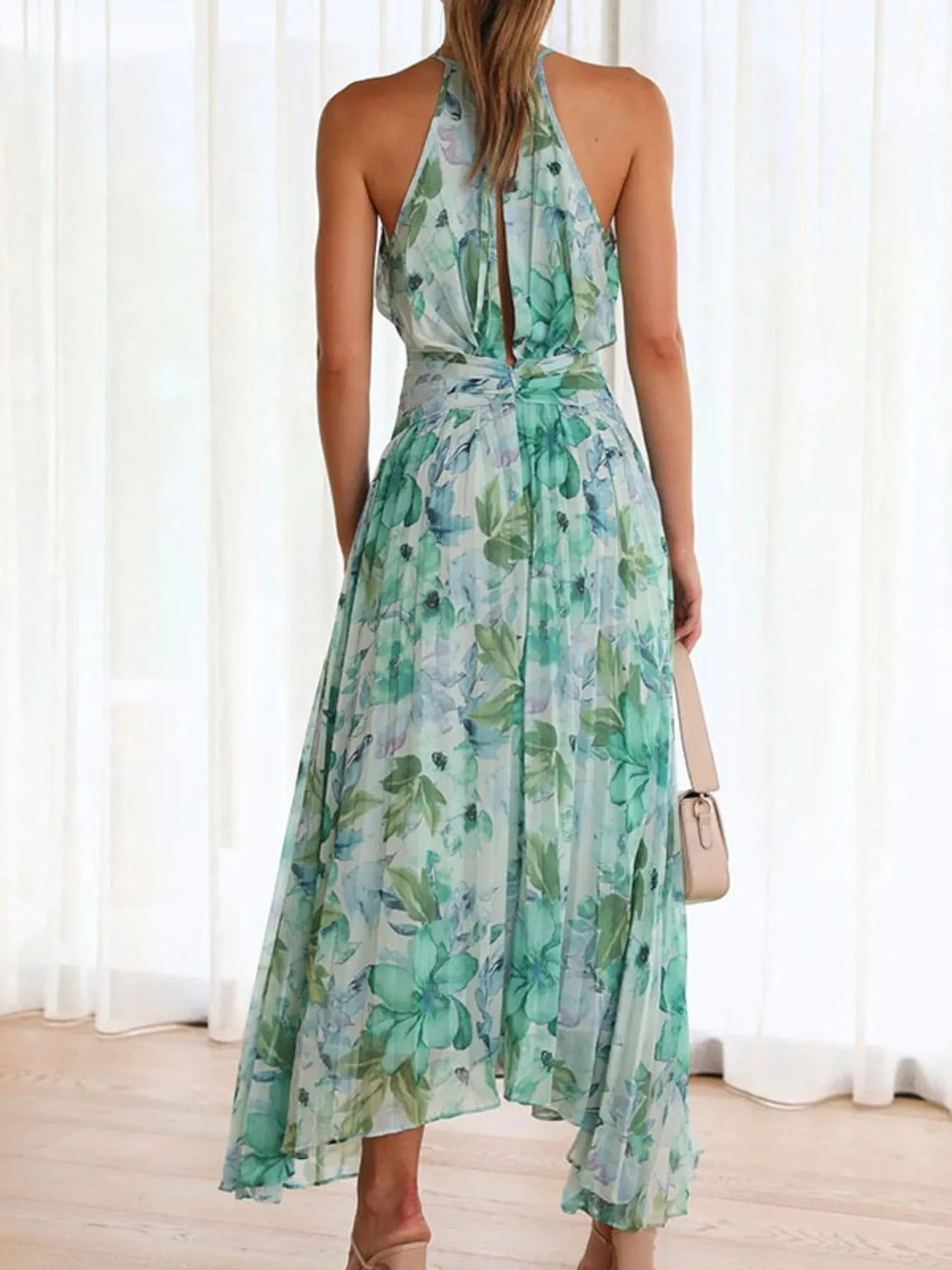 Printed Sleeveless Pleated Dress.
